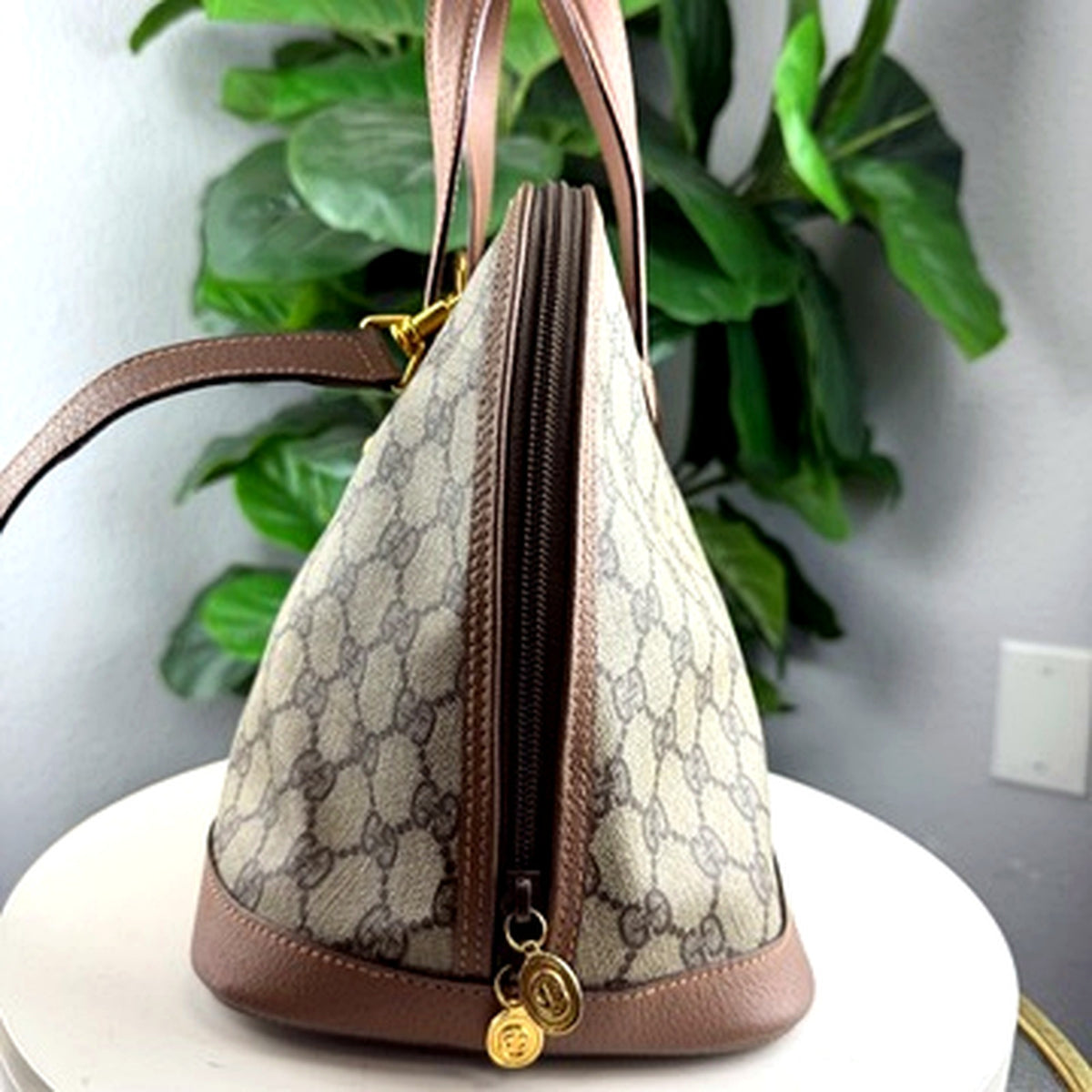 Gucci GG Supreme dome bag, side profile view