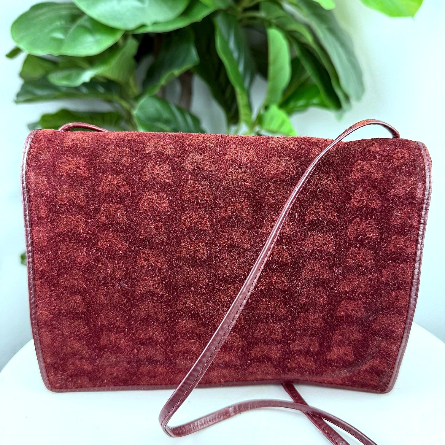 Vintage burgundy suede butterfly embossed crossbody bag, back view