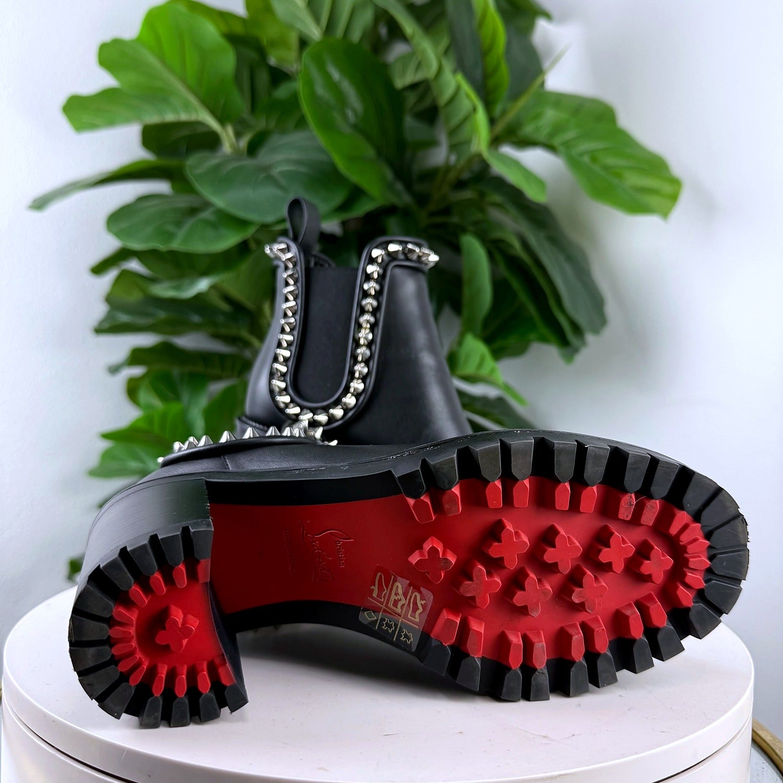 Back view showing the red Christian Louboutin sole and heel pull-tabs