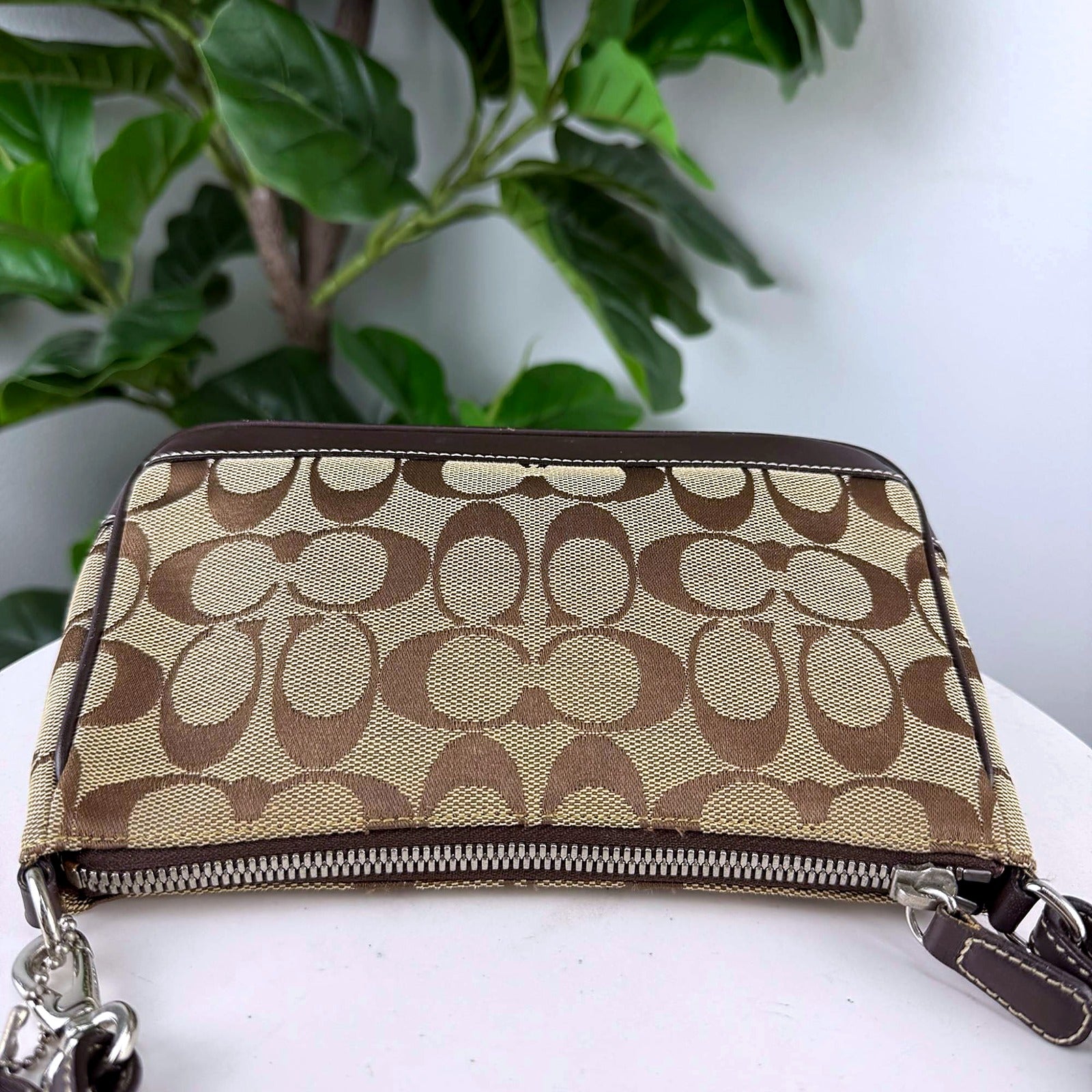 Authentic Coach tan Signature canvas pouch shoulder bag, back view