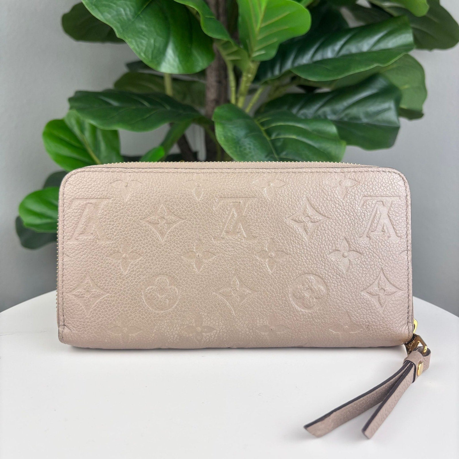 Authentic Louis Vuitton Monogram Empreinte Zippy Wallet.