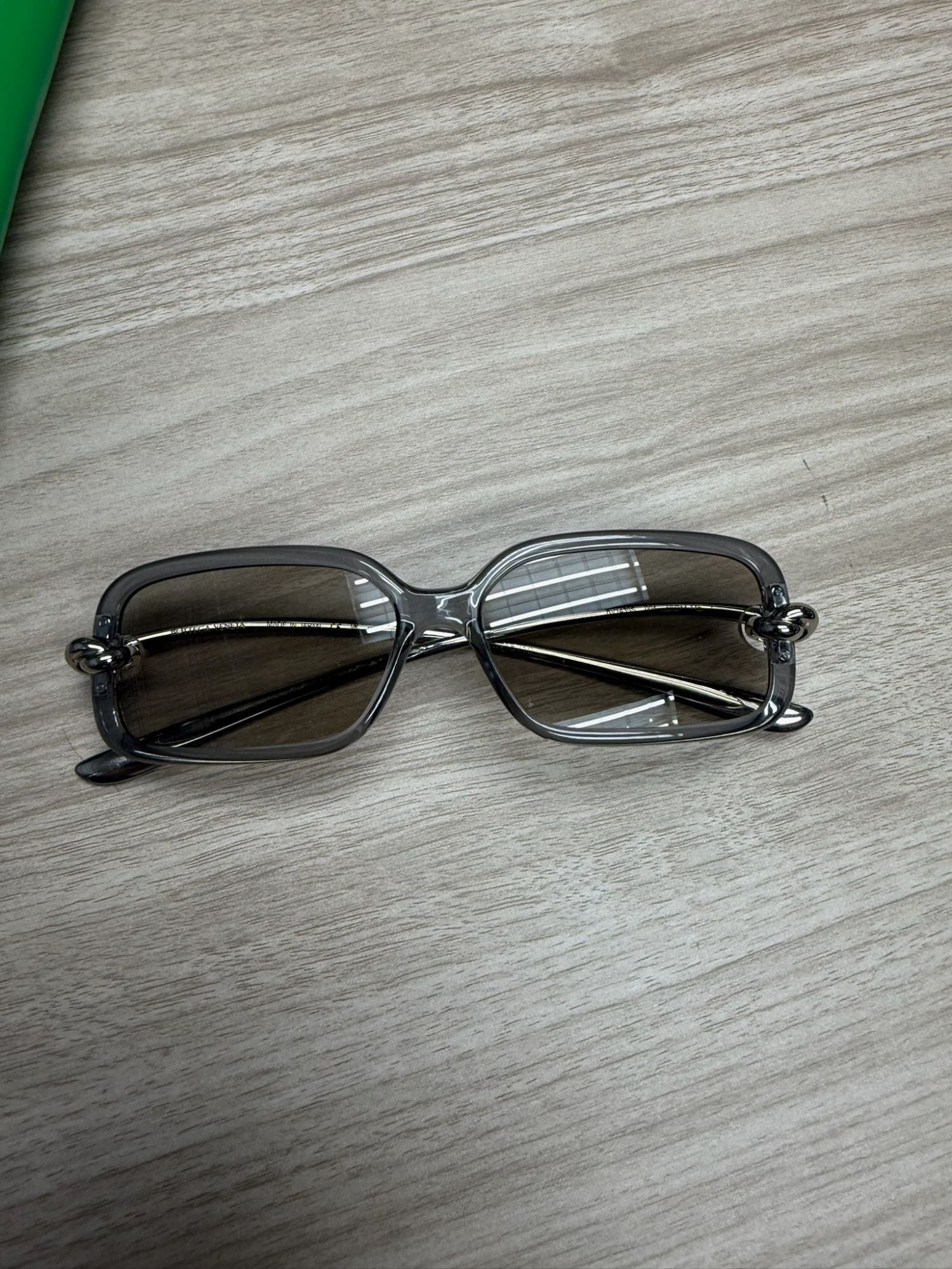 Bottega Veneta Knot Rectangular Sunglasses grey frame with BOTTEGA VENETA MADE IN JAPAN engraving