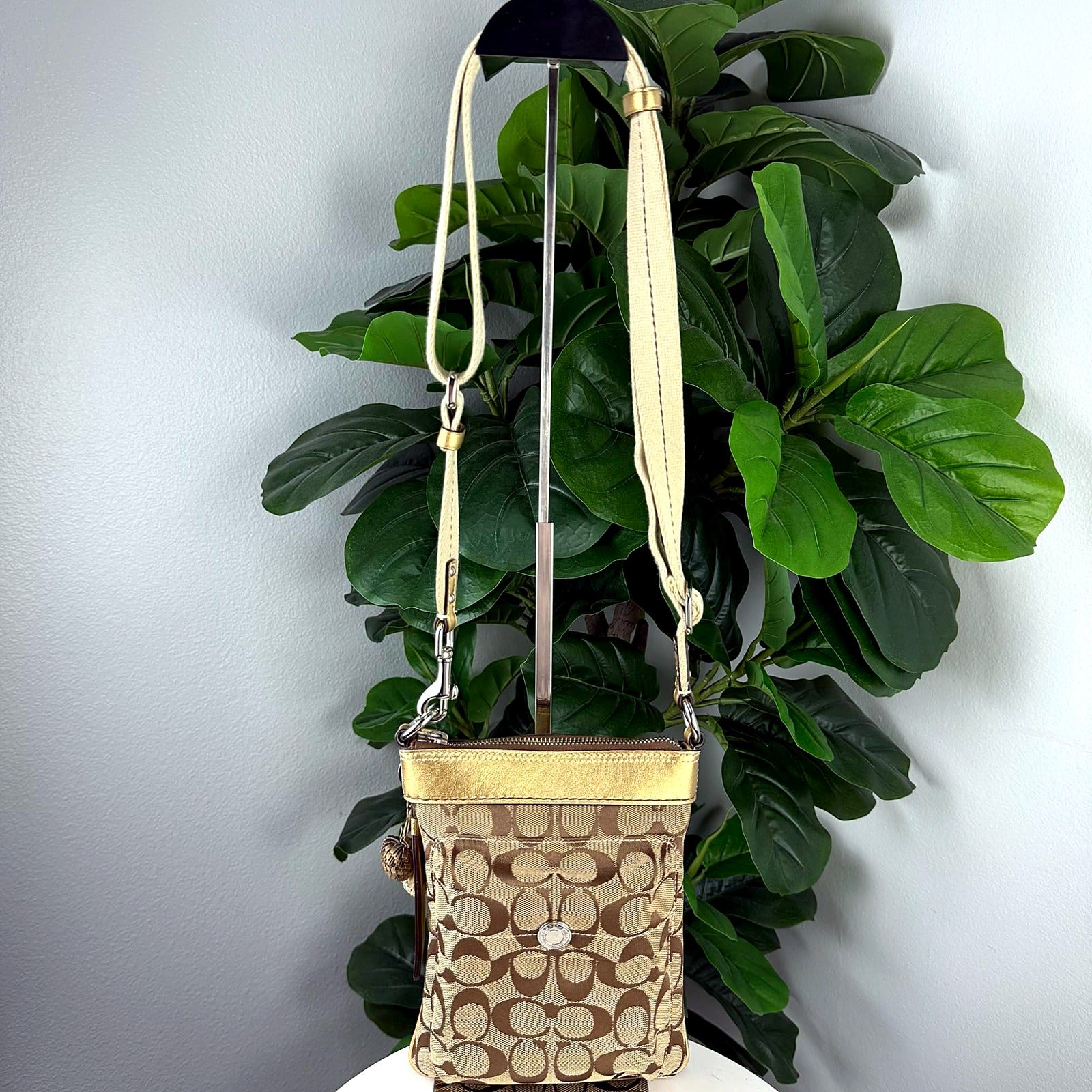 Authentic Coach Gold Signature Canvas Crossbody Swingpack - front