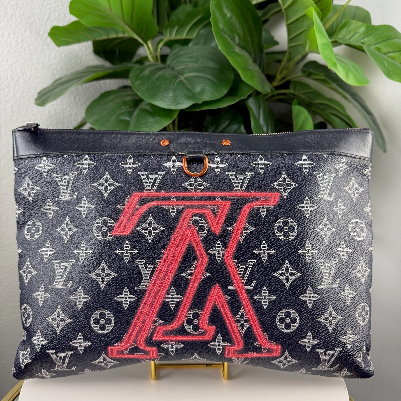 Authentic Louis Vuitton Navy Ink Monogram Canvas Upside Down Apollo GM Pochette