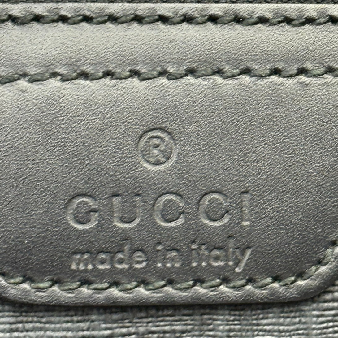 Gucci GG Coated Canvas Front Zip Flat Messenger Bag Black Medium Authentic Pre Owned