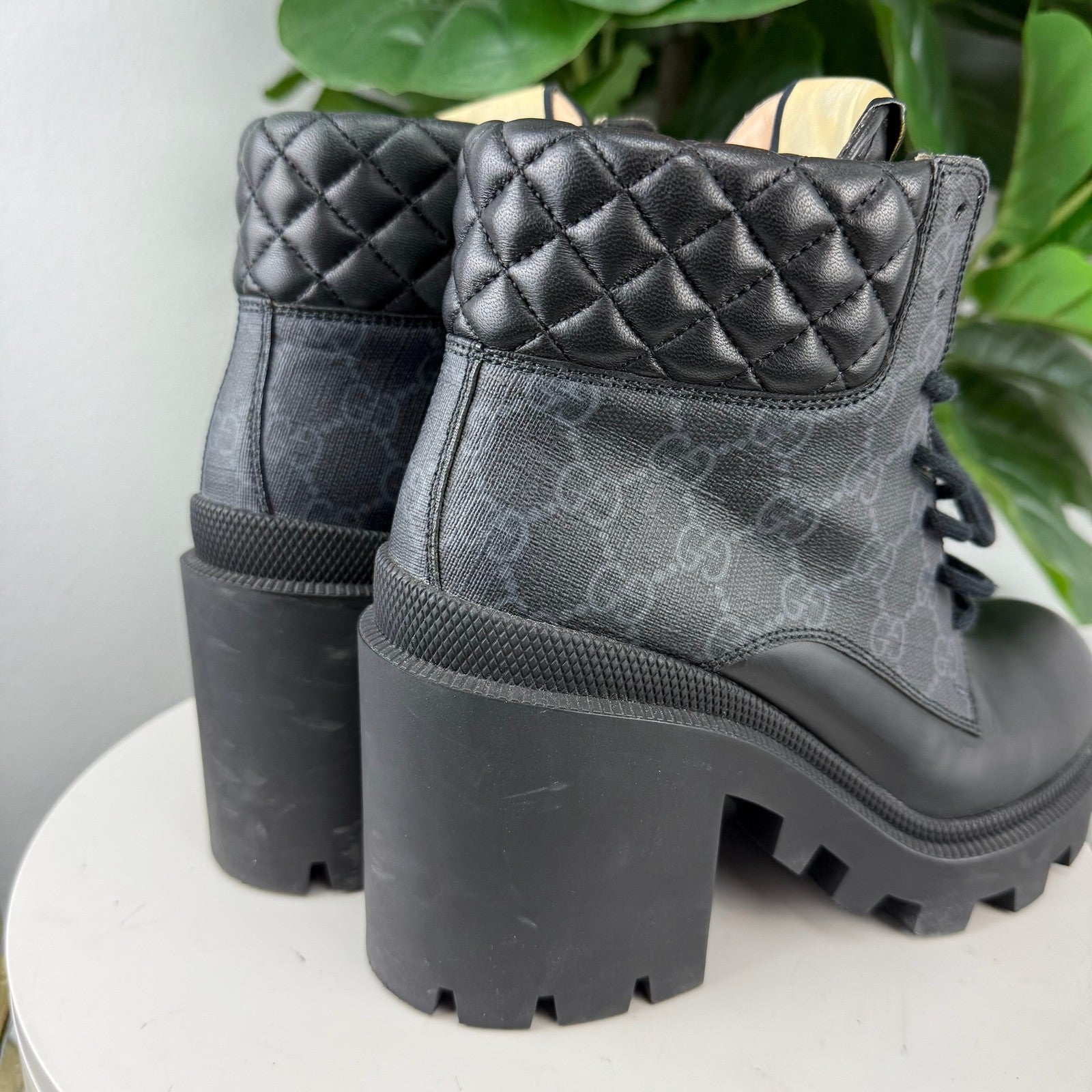 Gucci GG Supreme quilted heeled combat boots - view 1