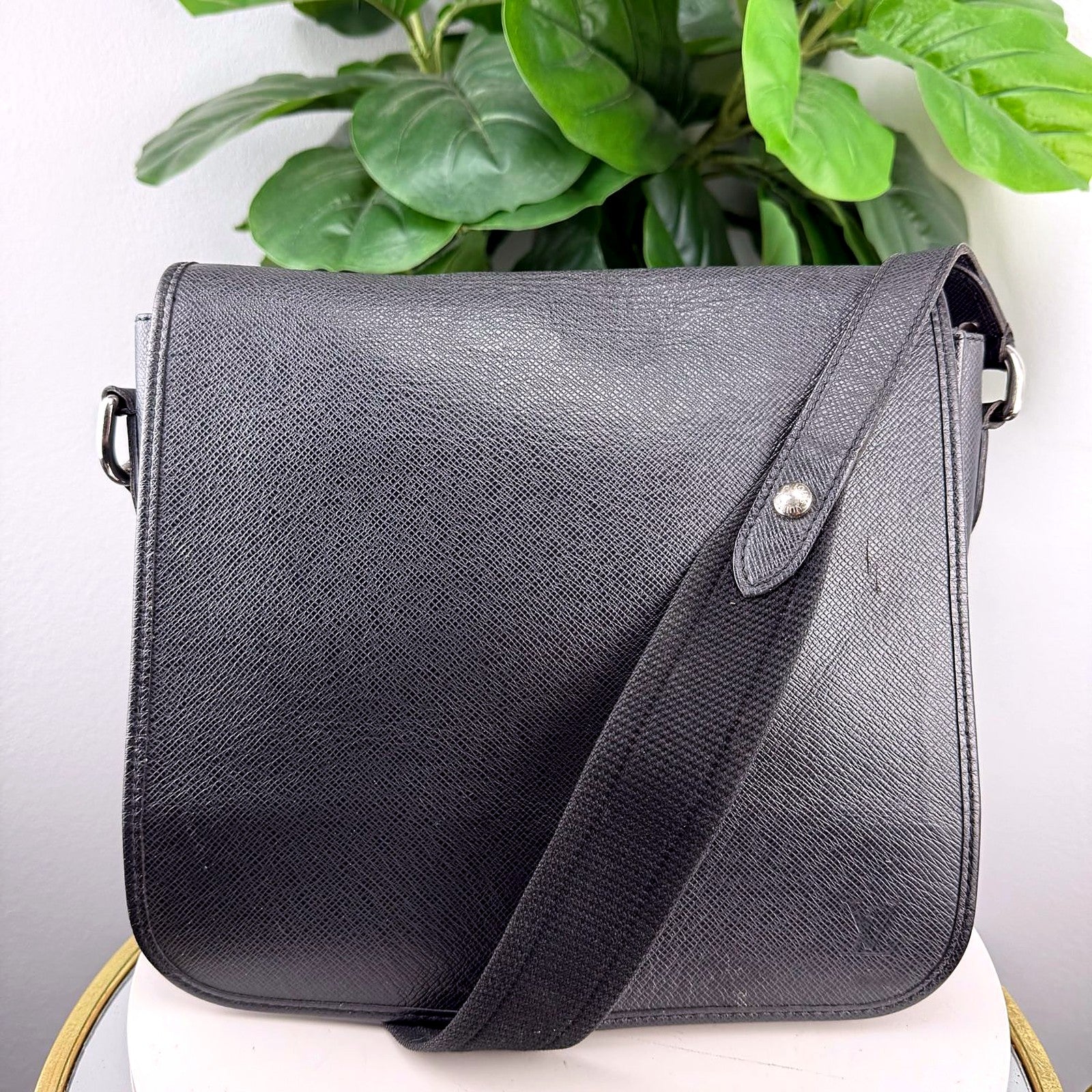 Authentic Louis Vuitton Black Taiga Leather Flap Messenger Bag - front view