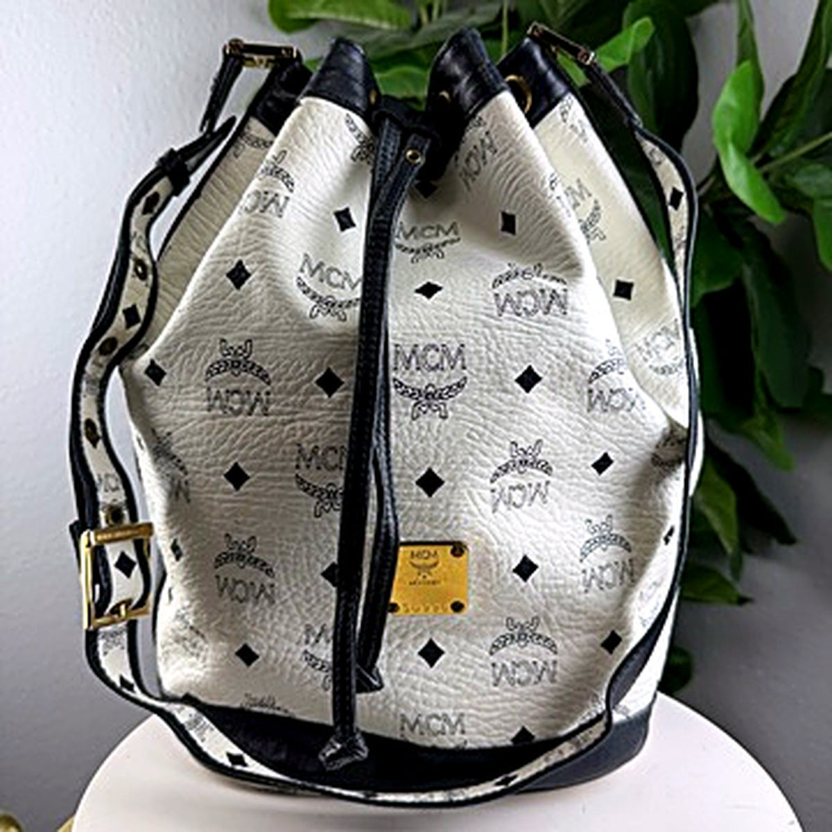Authentic vintage MCM Visetos white and black drawstring bucket bag, front view