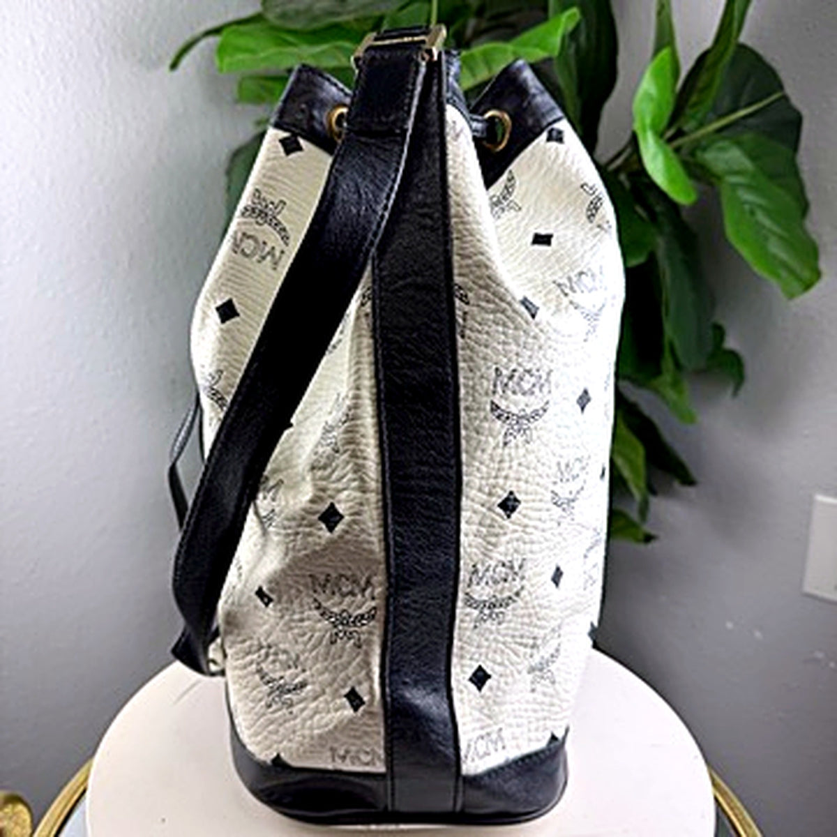 MCM Visetos bucket bag, side view with shoulder strap