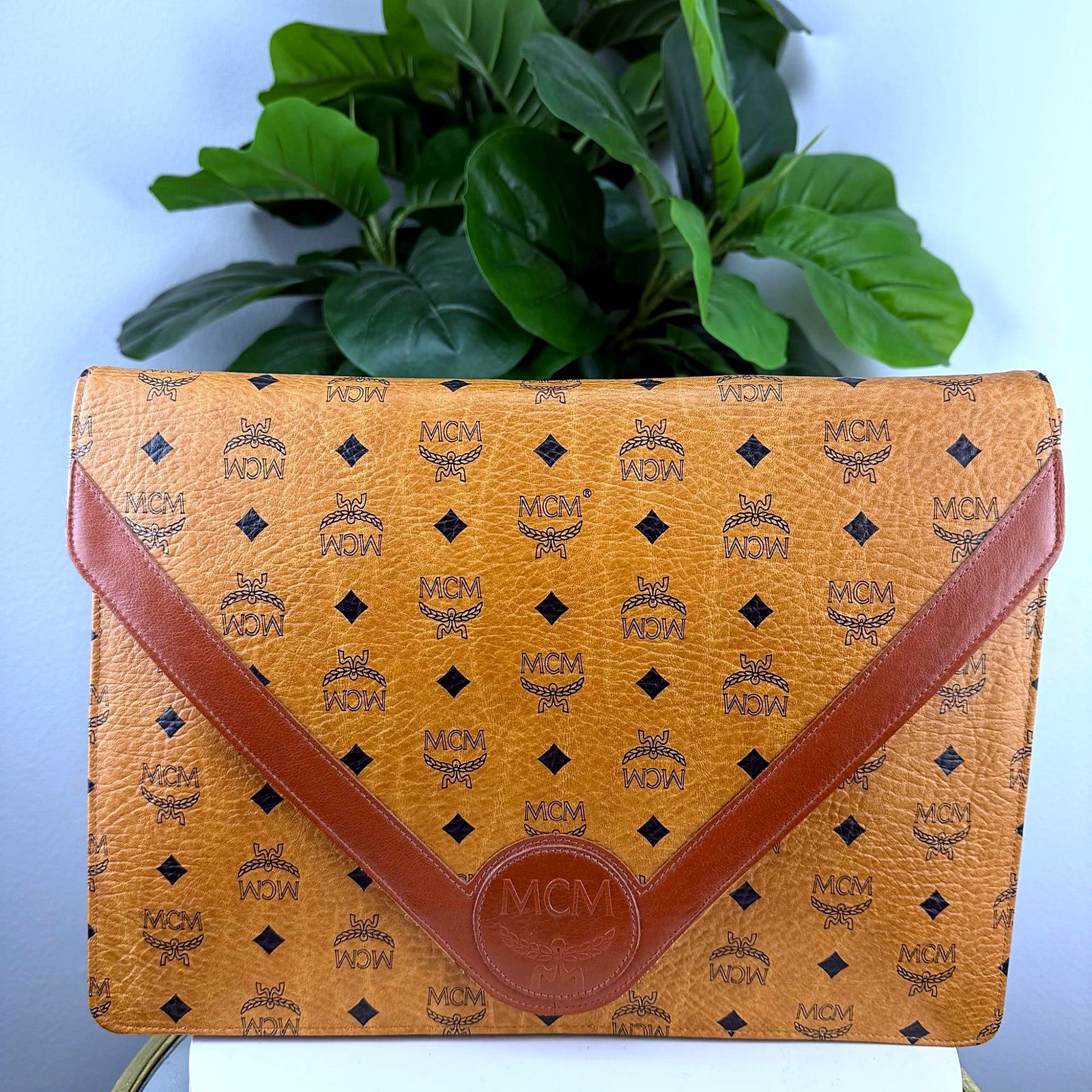 Authentic MCM Cognac Visetos Envelope Clutch - front